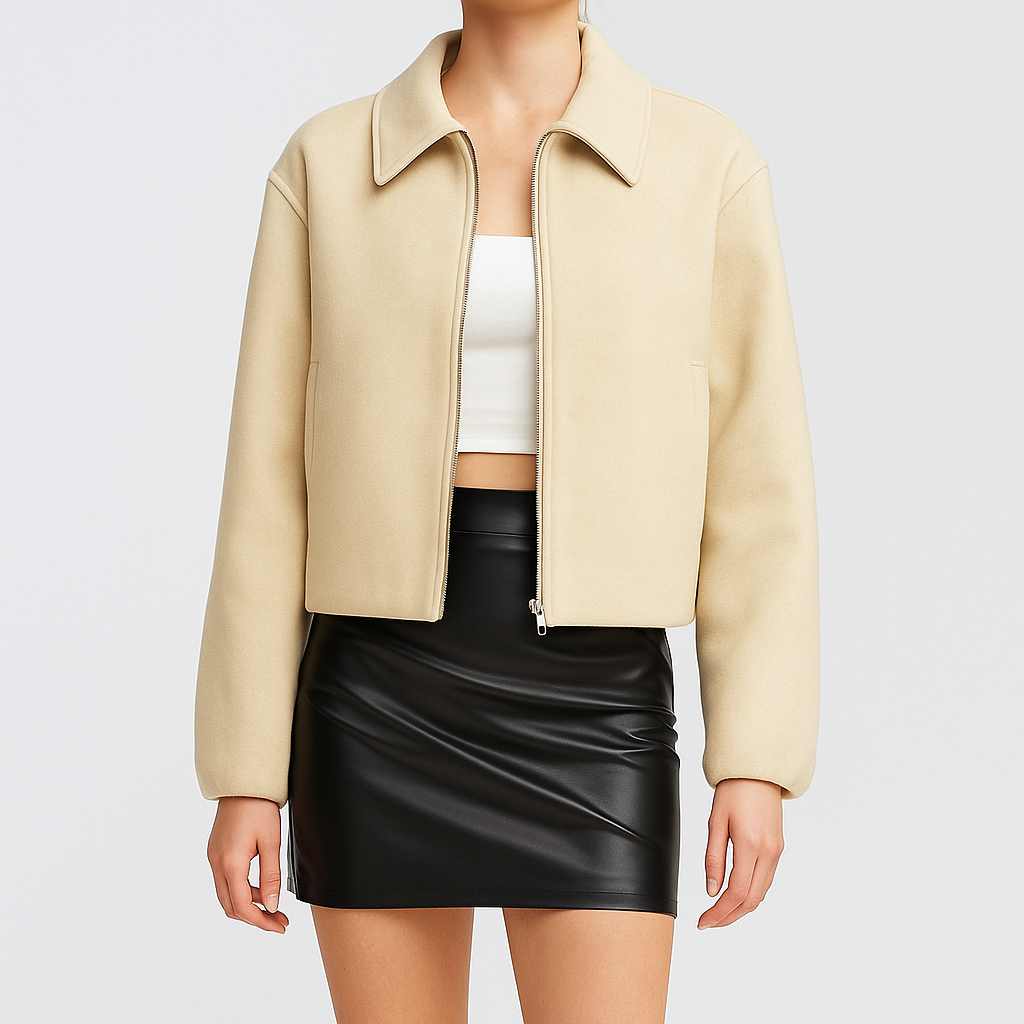 Zip-up jacket with classic collar, long sleeves, and side welt pockets.