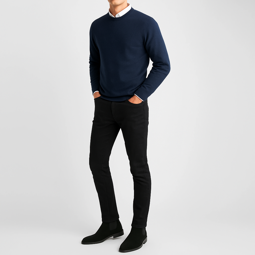 Suede Chelsea boot with elastic side panels, pull tab, and low heel design.